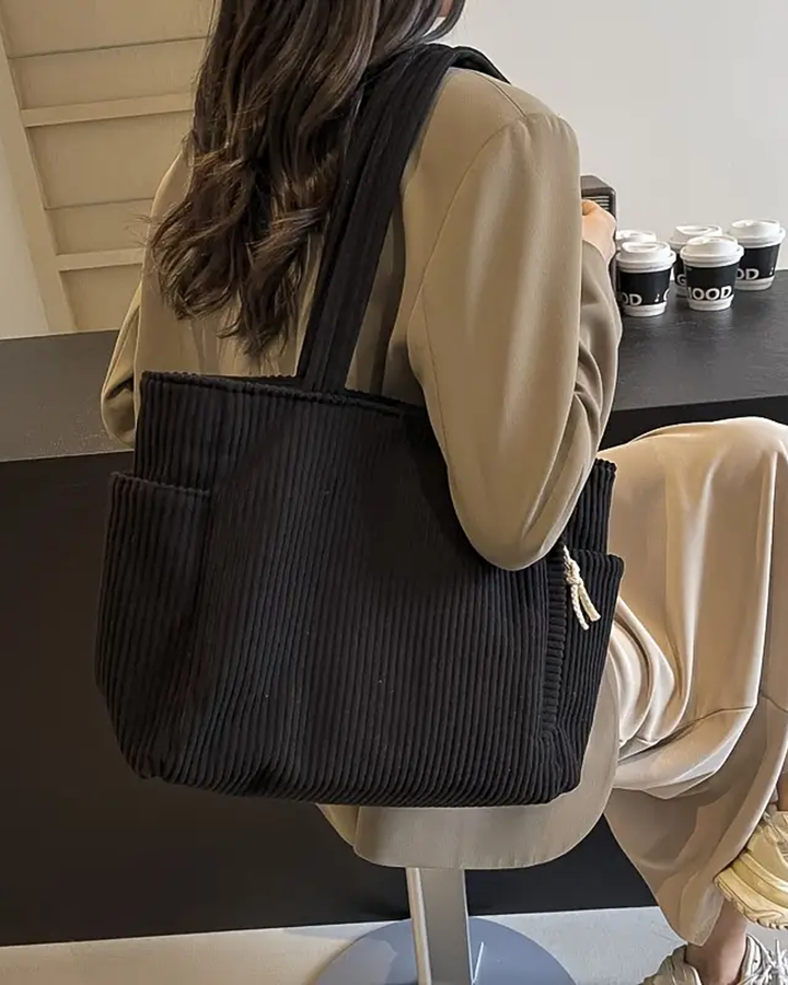 Mille™ | Ribbet Mulepose med Snore-Detalje