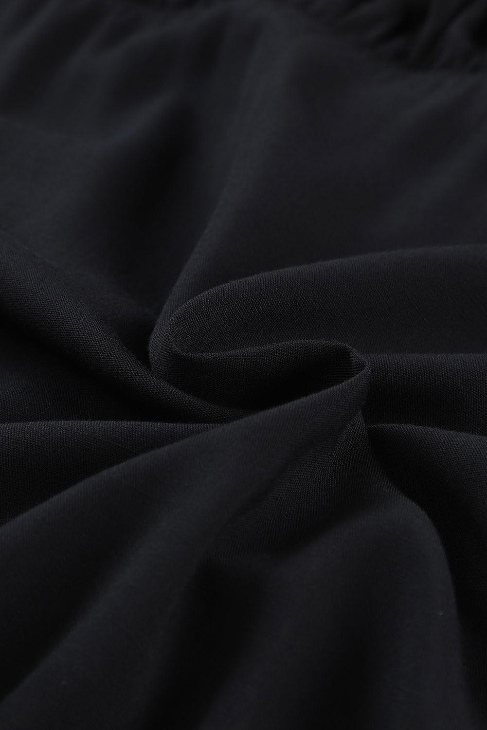 Emma™ | Elegant Sort Babydoll Mini Kjole med V-hals