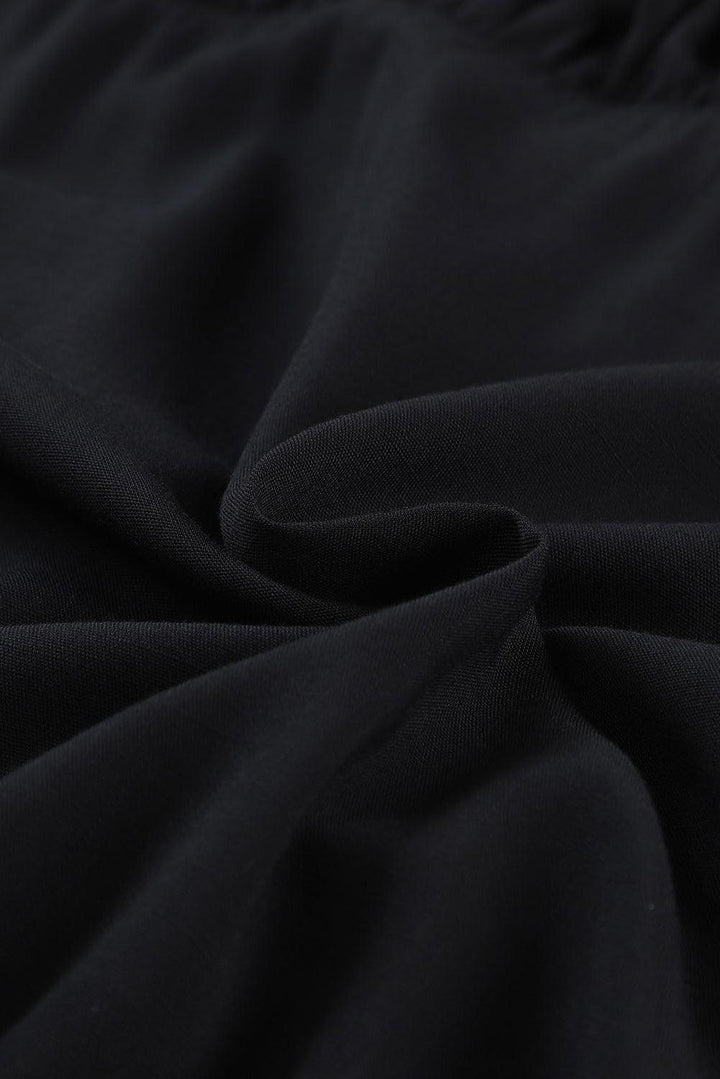 Emma™ | Elegant Sort Babydoll Mini Kjole med V-hals
